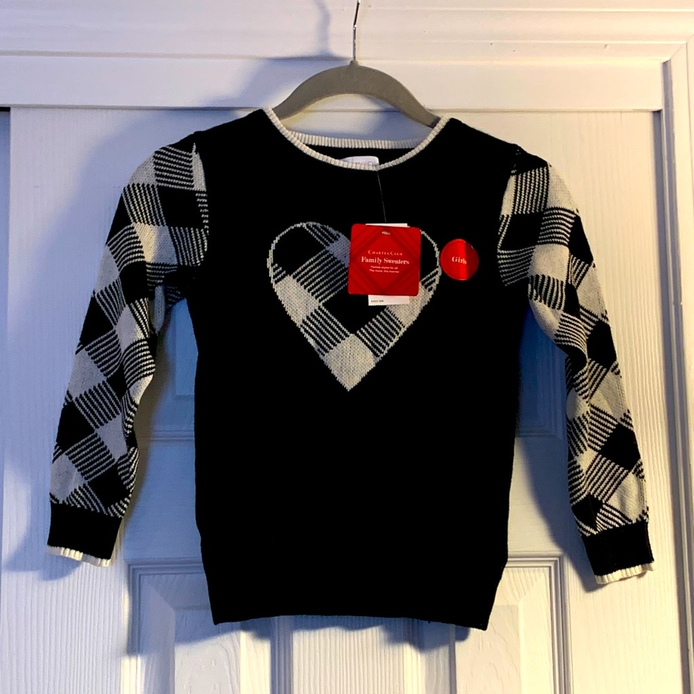 Brand new adorable black/white sweater with big heart design on front!!